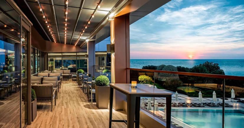 Retractable roof poolside venue at Renaissance Polat Istanbul for upscale corporate networking.