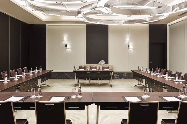 U-shape boardroom setup in Elara Meeting Room for professional collaborative meetings.