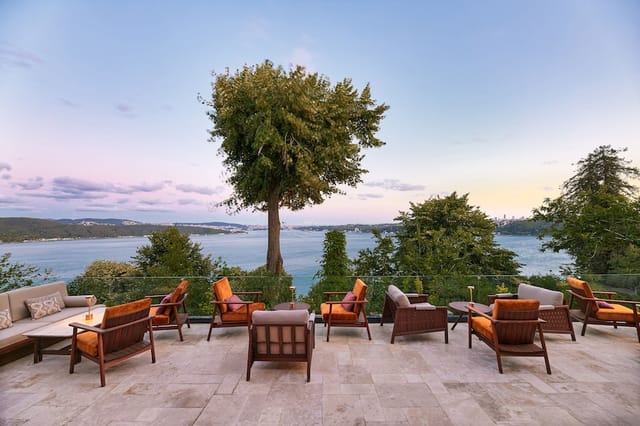 Outdoor ballroom terrace for executive sunset reception and corporate networking event.