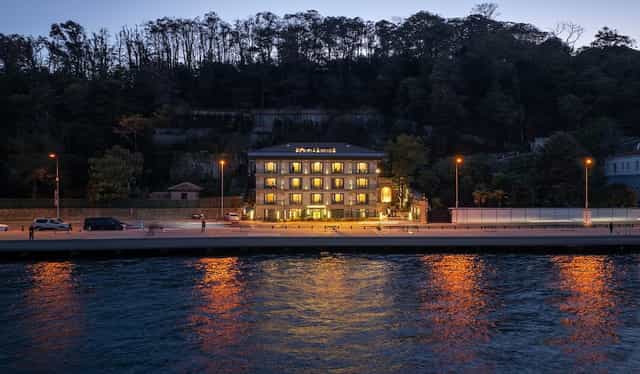 MFB Tarabya Hotel suite: luxury executive retreat with waterfront views for corporate events.