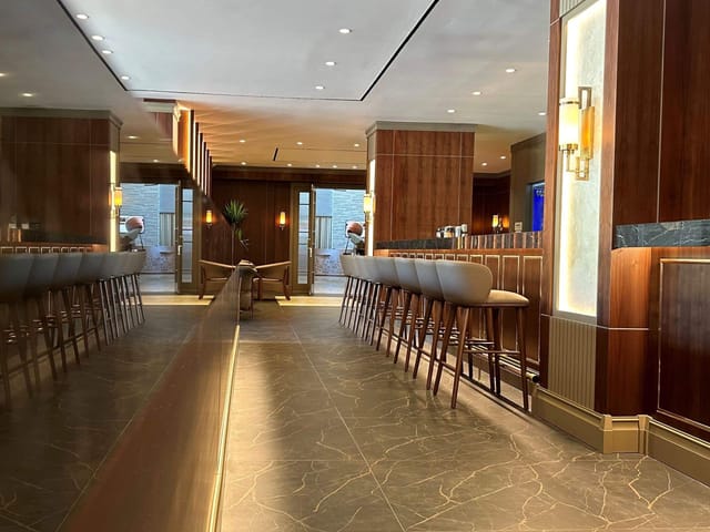 Sophisticated Gold Bar interior for VIP receptions and networking cocktail events.