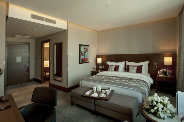 VIP hotel guest room at Crowne Plaza Istanbul for luxury business conference accommodations.