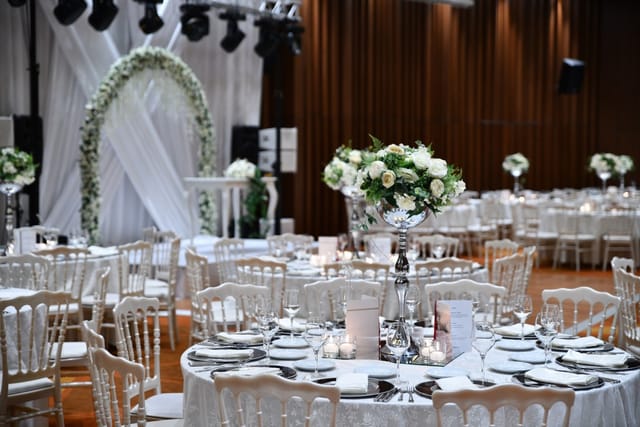 Elegant Golden Horn Ballroom gala setup with floral centerpieces for wedding and corporate events.