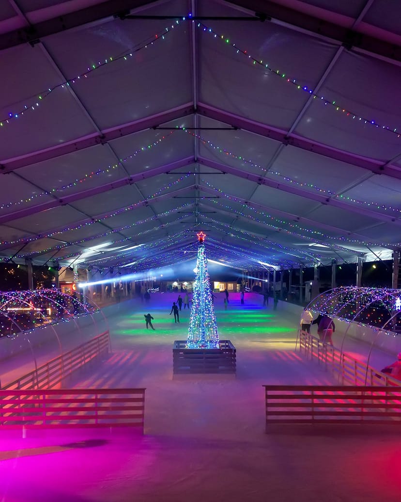 Uniq Istanbul ice rink inside a holiday event tent with atmospheric lighting for experiential activation.