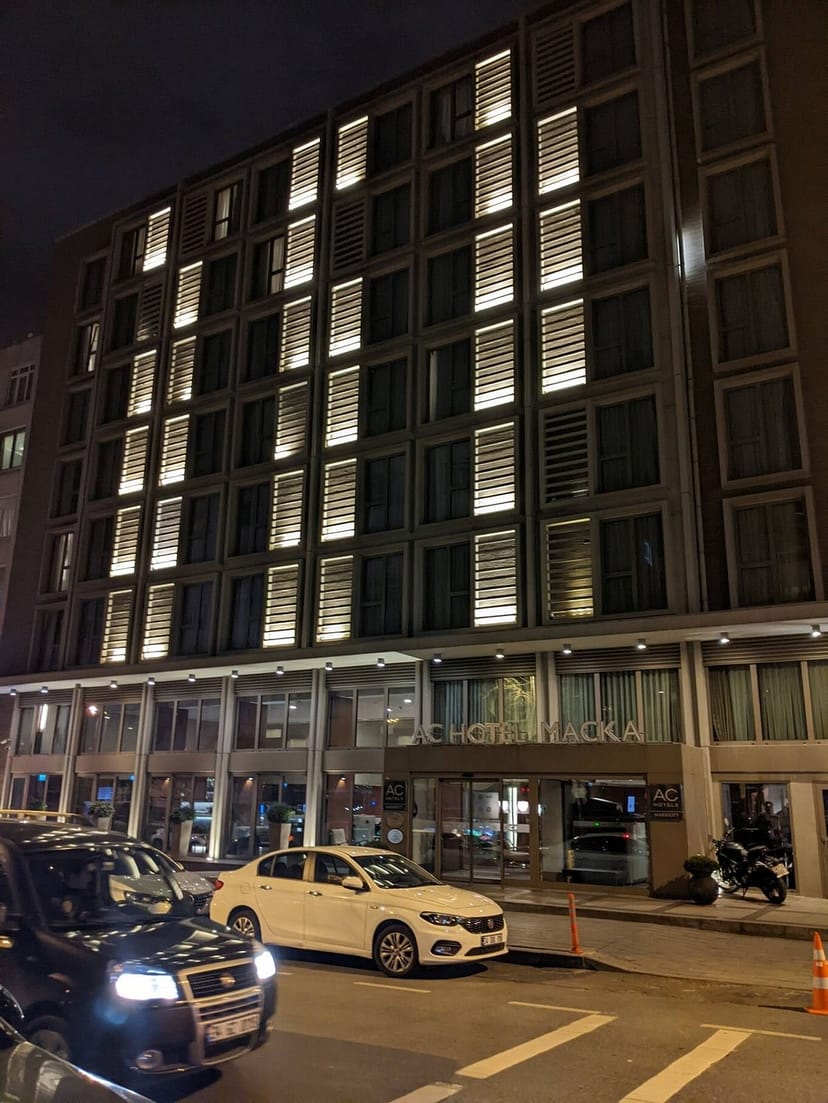 AC Hotel Istanbul Macka conference room exterior at night for corporate meetings and business events.
