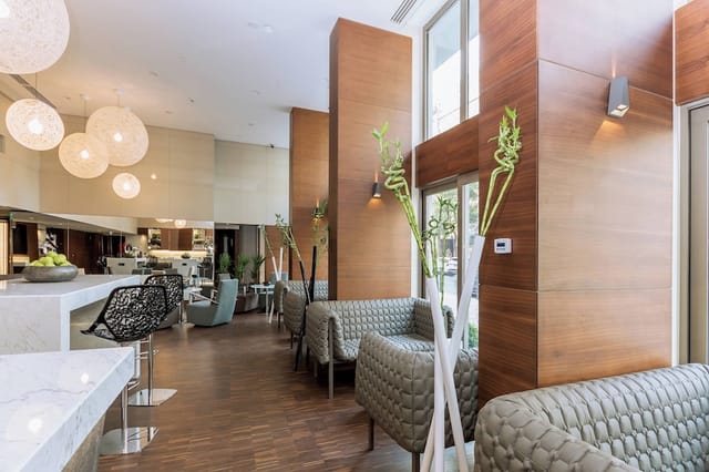Contemporary hotel lobby lounge at AC Hotel Istanbul Macka for business events and networking.