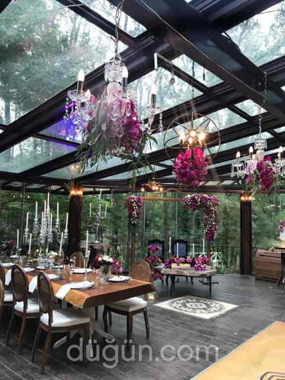 Izoletta Glass Salon with floral ceiling for luxury weddings and corporate events.