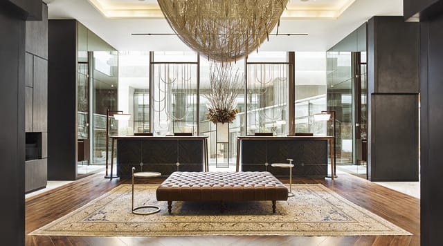 Ukiyo hotel lobby with dramatic chandelier for VIP event check-in and corporate registration.
