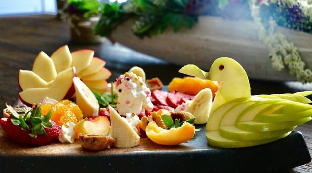 Whimsical fruit platter at Huber Cafe for budget brunch or networking event catering.
