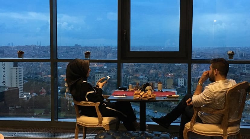 High-end restaurant with panoramic view for VIP breakout sessions and corporate networking events.