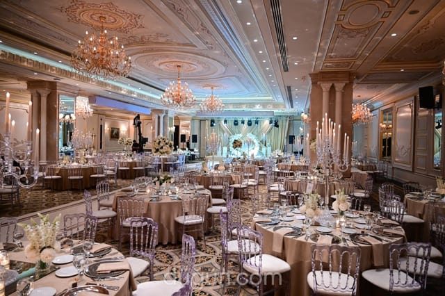 Luxury ballroom event space with crystal candelabras for elegant weddings and corporate dinners.
