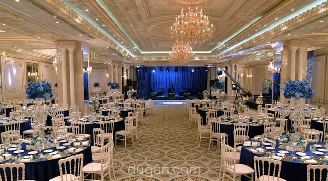 Elegant gala ballroom with crystal chandeliers, ideal for awards galas and corporate celebrations.