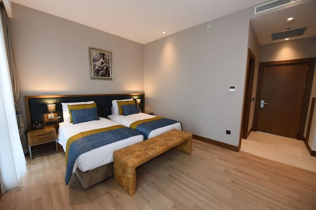 Liberty Square twin room at Cher Hotel & Spa for corporate meetings and conference breakouts.