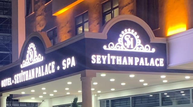 Seyithan Palace Hotel illuminated exterior for corporate events and evening hospitality.