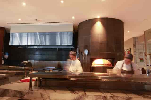 High-end show kitchen for interactive catering and corporate event dining.