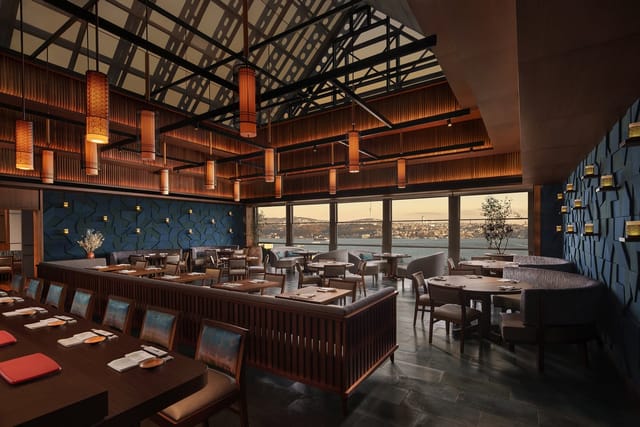 Nobu Istanbul dining room with waterfront views for corporate dinners and VIP events.