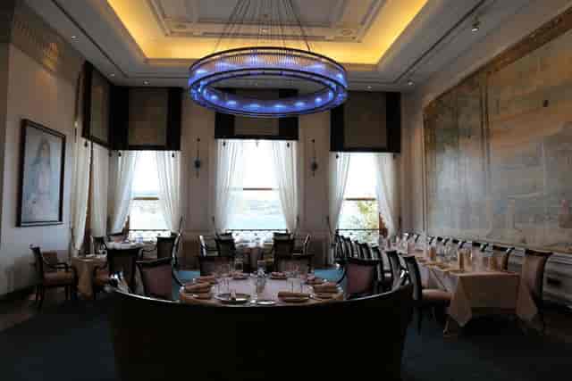 Tugra Restaurant private dining with crystal chandelier for corporate dinners and VIP luncheons.