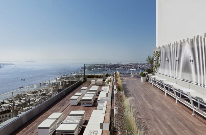 Rooftop bar at Upperist with waterfront views for networking receptions and brand activations.