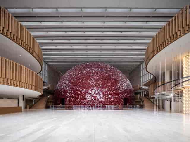 Modern theater foyer with iconic dome for luxury brand activations and grand opening events.