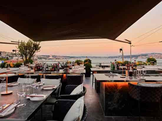 Rooftop lounge at Frankie with sunset views, ideal for premium corporate events and receptions.