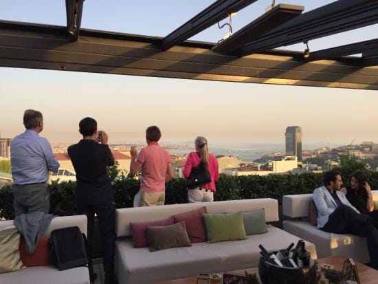 Rooftop lounge at Frankie Restaurant for corporate networking reception and client event.