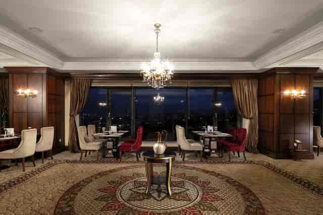 Club Lounge event space with wood paneling for VIP dinners and corporate board meetings.