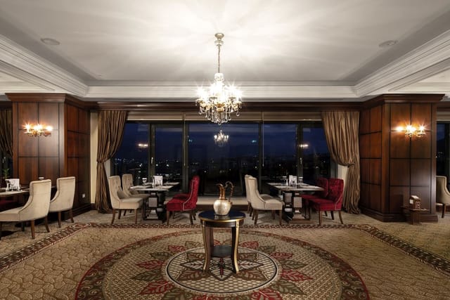 Club Lounge event space with wood paneling for VIP dinners and corporate board meetings.