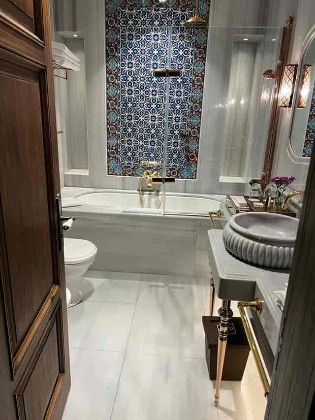 Luxury AJWA Hotels guest bathroom, marble finishes for VIP site inspections and executive stays.