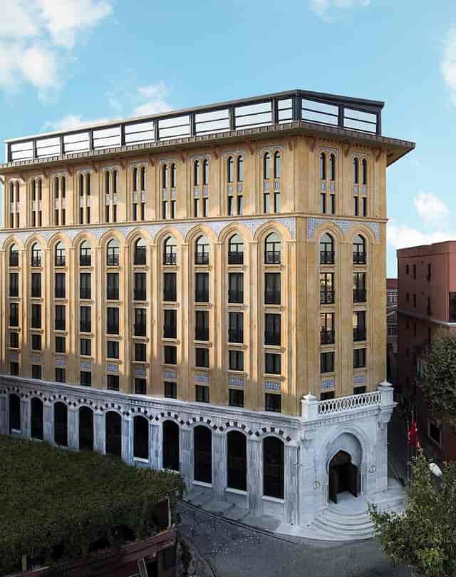 Upscale AJWA Hotel suite featuring heritage architecture for corporate retreats and board meetings.