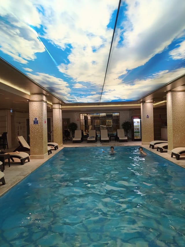 Indoor hotel pool at Miss Istanbul Spa, perfect for wellness retreats and corporate relaxation.