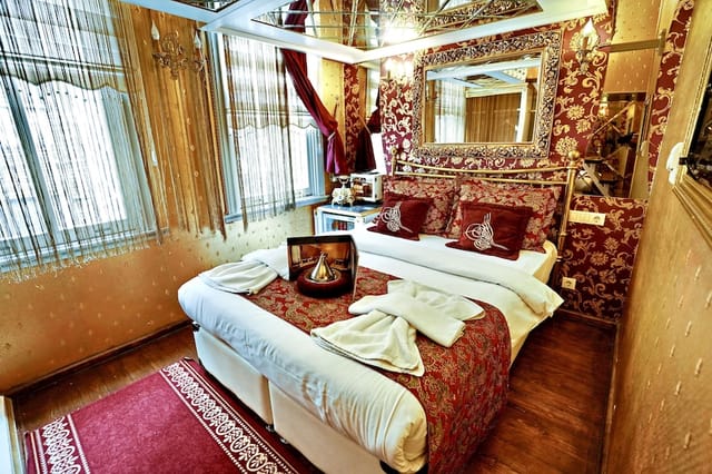 Boutique suite at Sultan Tughra Hotel with patterned decor for luxury travel and romantic getaways.