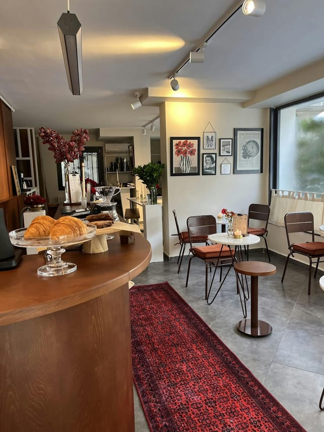Boutique breakout space with plush seating for high-end hospitality and event networking.