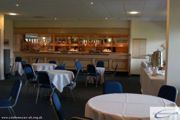 Hall of Fame Lounge with fixed bar, ideal for casual social mixers and event networking.