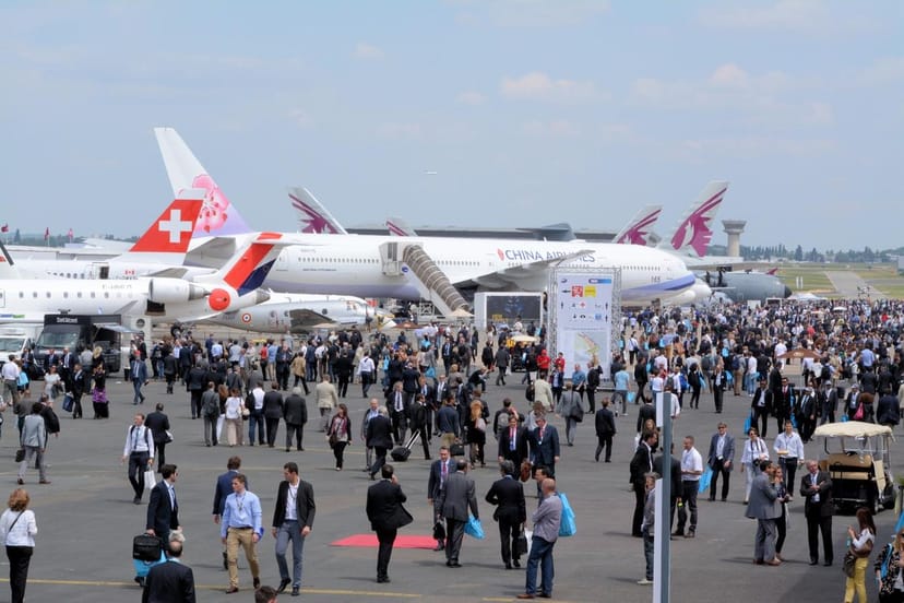Outdoor Surfaces at Paris Air Show: trade show booth and aviation networking event.