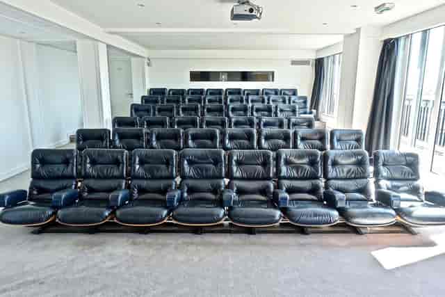 Auditorium at Terrasse Champs Elysees: tiered leather seating for corporate presentations and events.