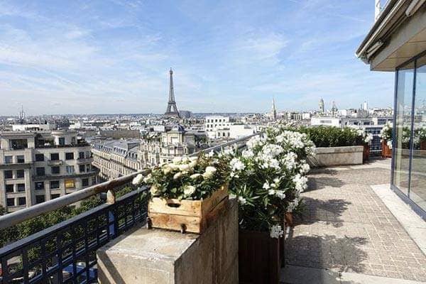 Terrasse des Champs-Elysées rooftop with Eiffel Tower view for VIP networking and product launches.