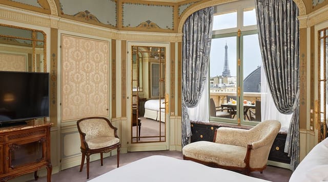 Luxury hotel suite with Eiffel Tower view for executive meetings and VIP travel.