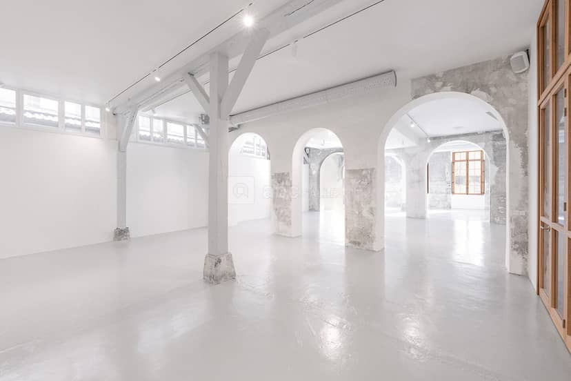 Industrial-chic Galerie Au Roi venue for minimalist brand activations and product launches.