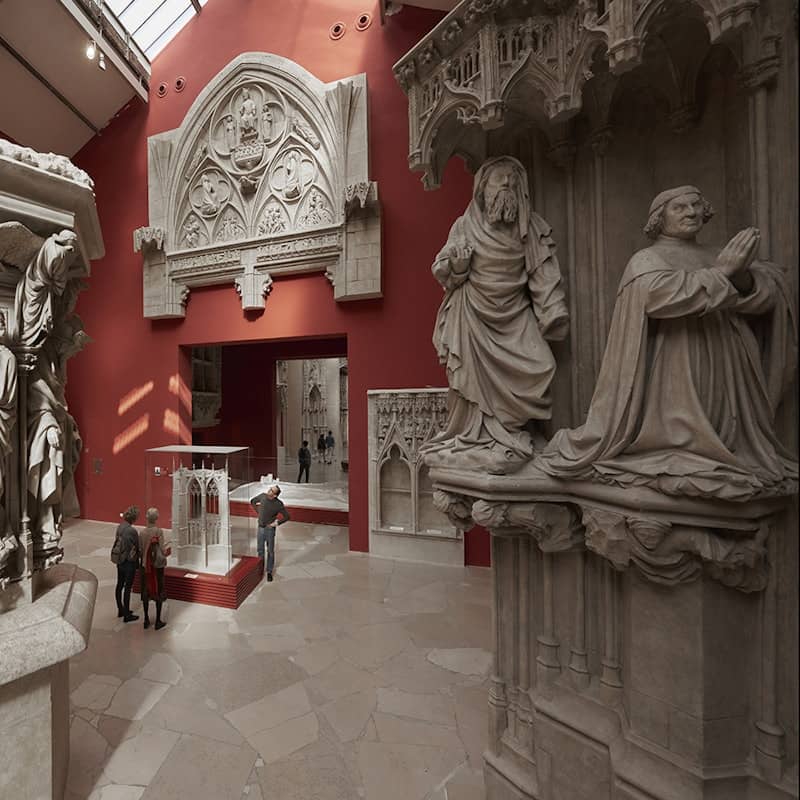 Terracotta gallery venue with historic stonework for cocktail receptions and high-end galas.