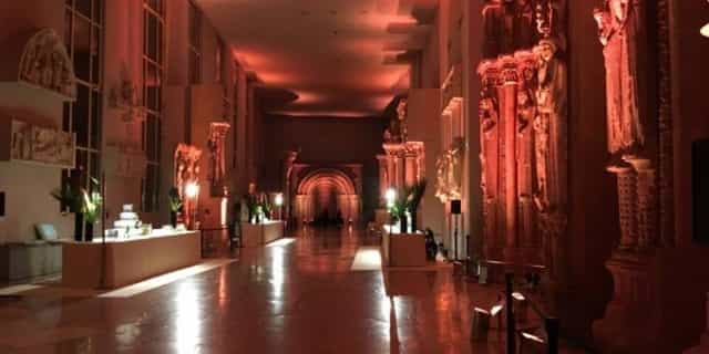 Sophisticated event space at Galerie des moulages with dramatic architectural lighting.