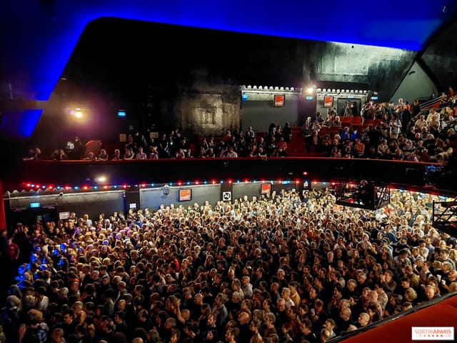 Sold-out L'Olympia performance hall with tiered seating for event venue rental and concert planning.