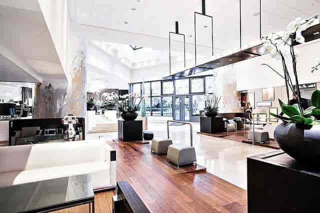 Upscale Novotel Paris Les Halles lobby with natural light for corporate event registration.
