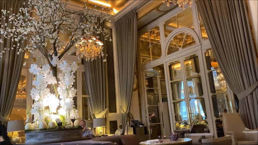 Luxury Jardin d'Hiver venue with floral decor for VIP receptions and upscale networking events.