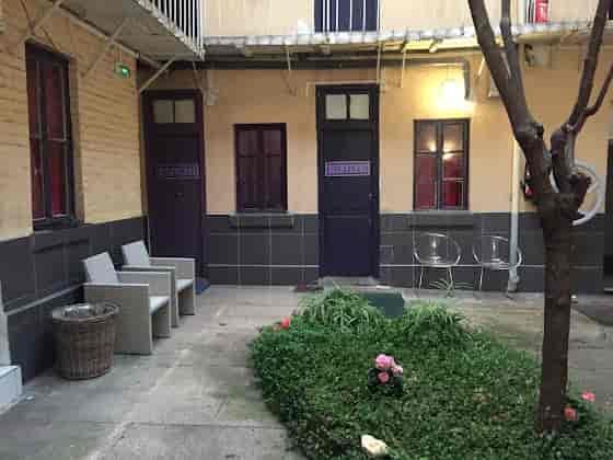 Modern hotel courtyard terrace with seating for intimate networking and corporate breakout events.