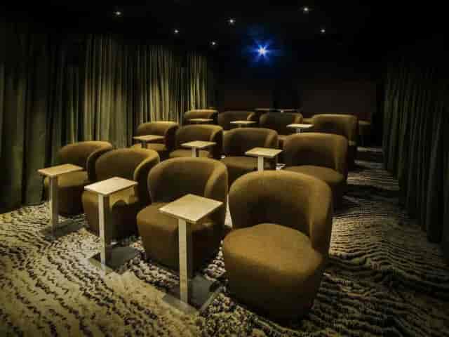 Private Cinema in The Loft with luxury seating, ideal for corporate presentations and networking.