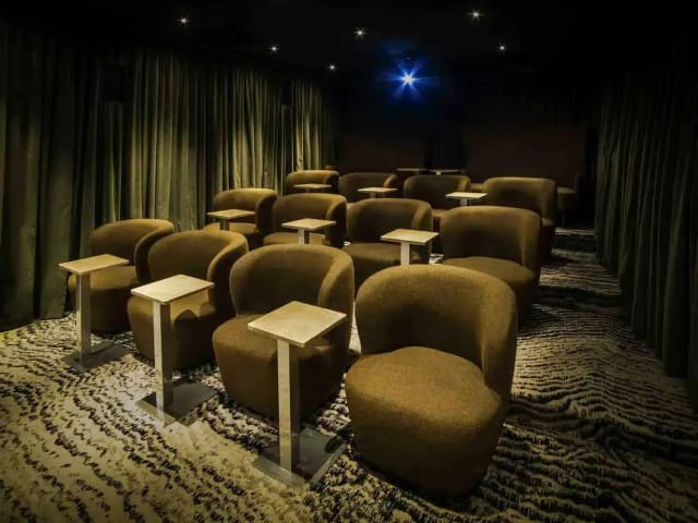 Private Cinema in The Loft with luxury seating, ideal for corporate presentations and networking.