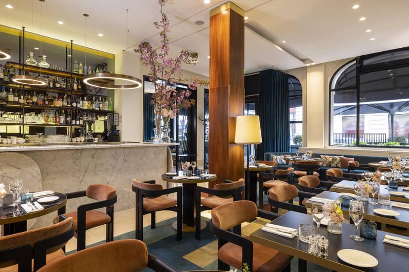 Upscale restaurant fireplace corner for corporate receptions and VIP networking events.