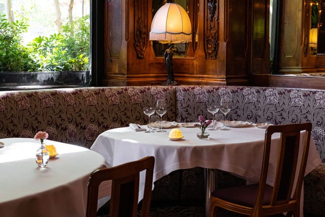 Elegant private dining room at Lucas Carton for executive business dinners and VIP events.