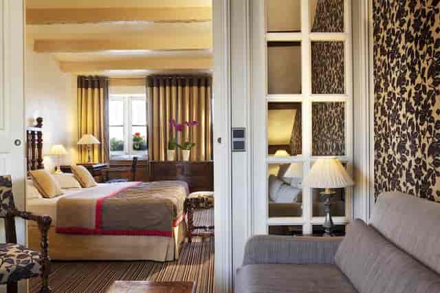 Luxury hotel suite lounge in Paris for VIP executive meetings and corporate travel.