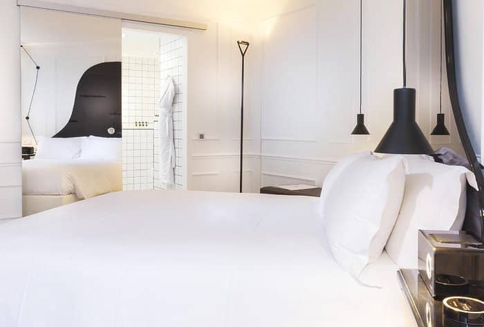 Contemporary luxury VIP suite at La Maison Champs Elysées for upscale event accommodations.
